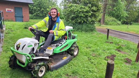 Sam cutting the grass